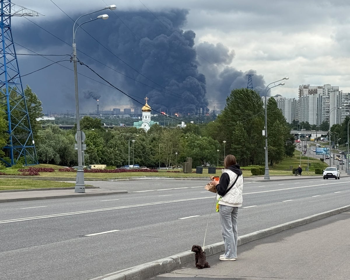 Black smoke rises from the area of the Russian oil producer Gazprom Neft’s Moscow oil refinery on the south-eastern outskirts of Moscow.