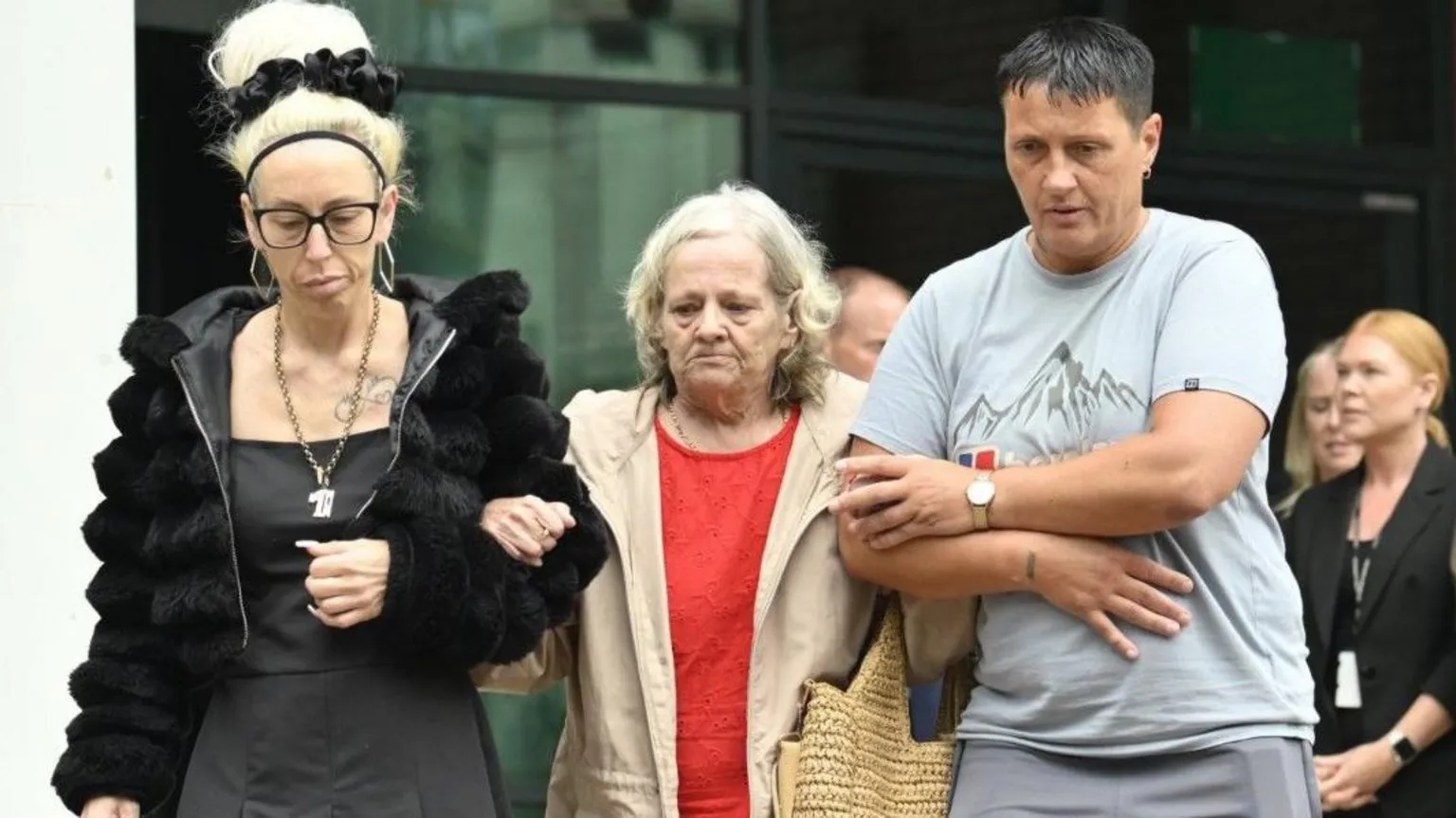 Preston Davey's birth mother Sarah Davey is walking out of Preston Crown Court with her family.