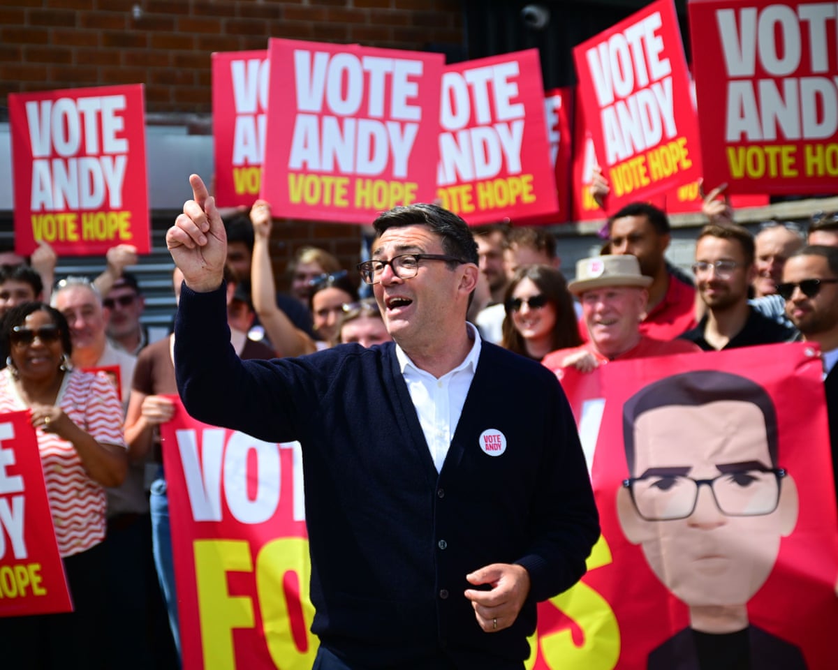 Makerfield byelection polling day. Andy Burnham with supporters.