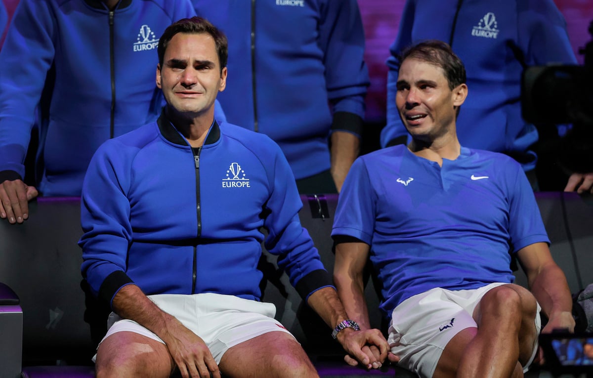 Roger Federer and Rafael Nadal in tears and holding hands after their doubles game v Frances Tiafoe and Jack Sock, the final match before Federer’s retirement, during day one of the 2022 Laver Cup