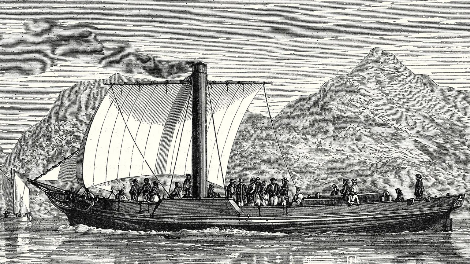  A black and white drawing of the original Comet, a ship with a slim funnel and a sail to provide extra power. There is smoke coming from the funnel and a number of people on board.