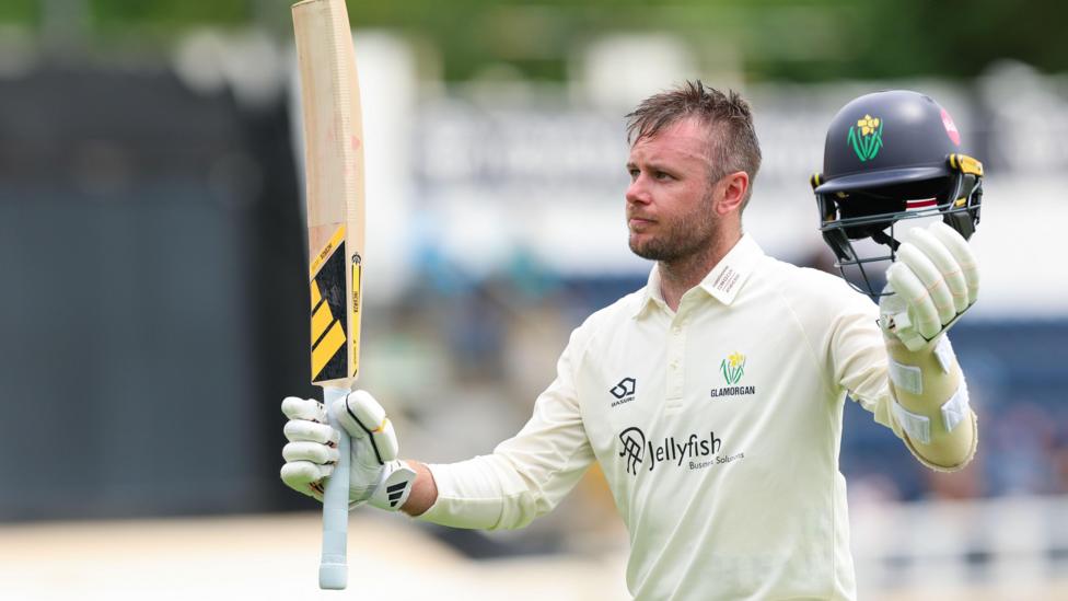 Mason Crane celebrates reaching a century