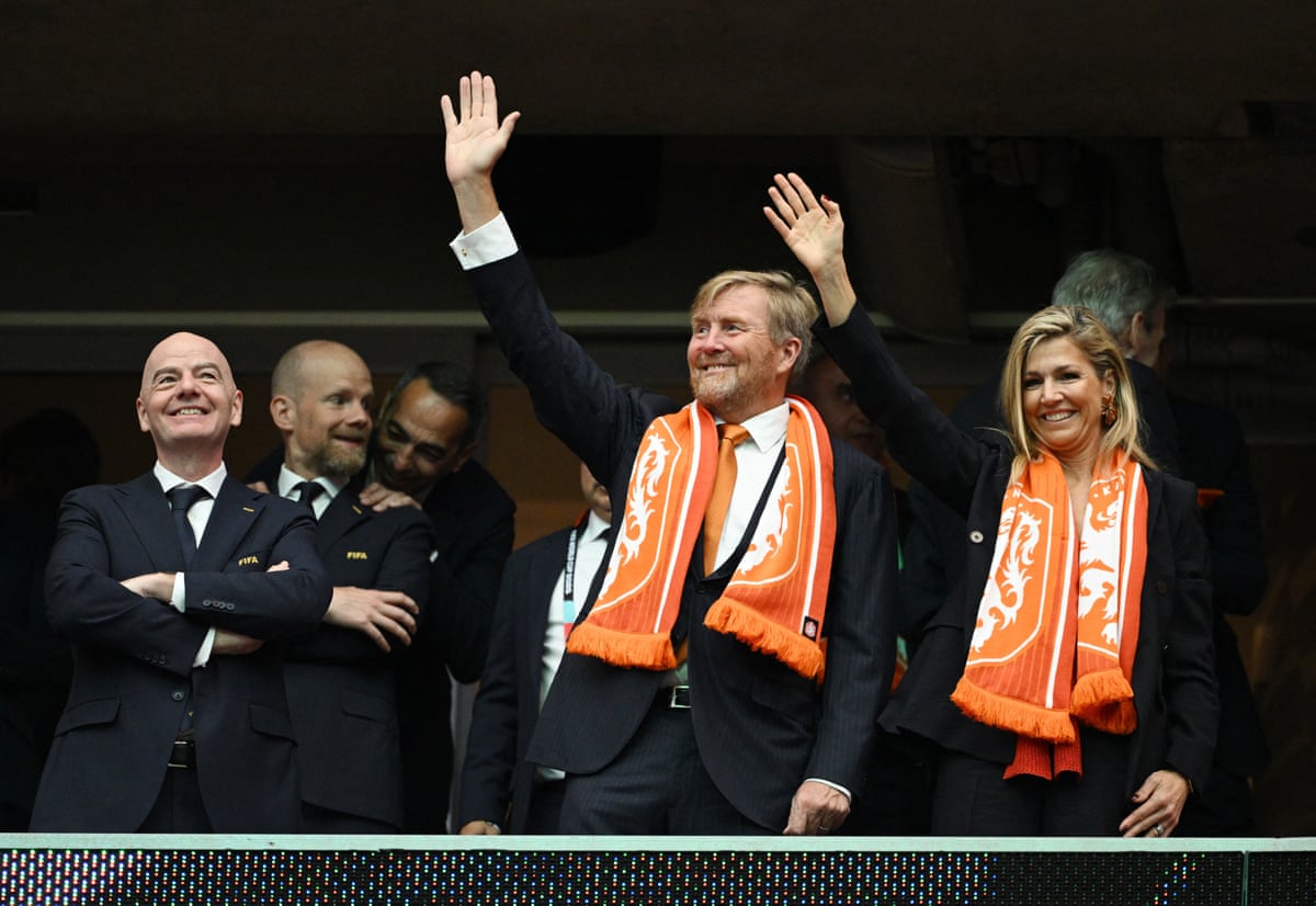 King Willem-Alexander and Queen Maxima of the Netherlands wave to fans.