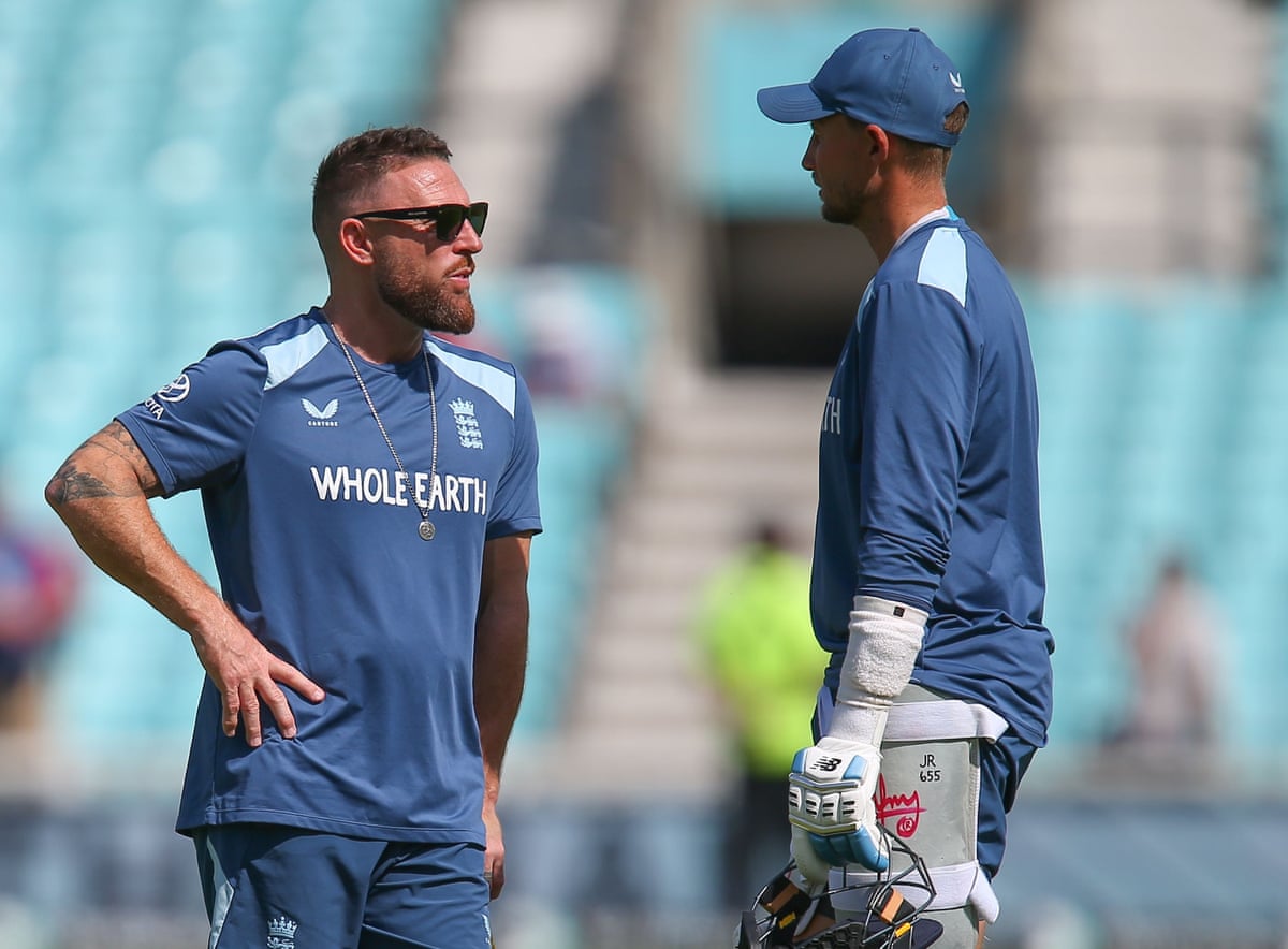 Brendon McCullum discusses the scale of the task ahead with Joe Root before the start of play on day five of the second Test