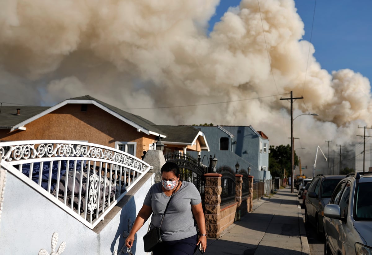 The warehouse fire continues to burn and spread smoke around the city on 20 June 2026 .