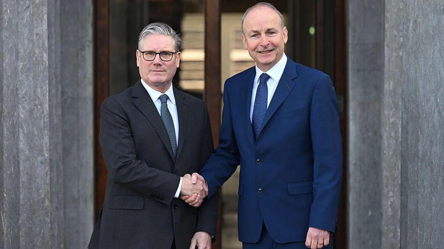  Prime Minister Keir Starmer and Taoiseach Micheál Martin shake hands prior to a UK Ireland Summit in 2026.