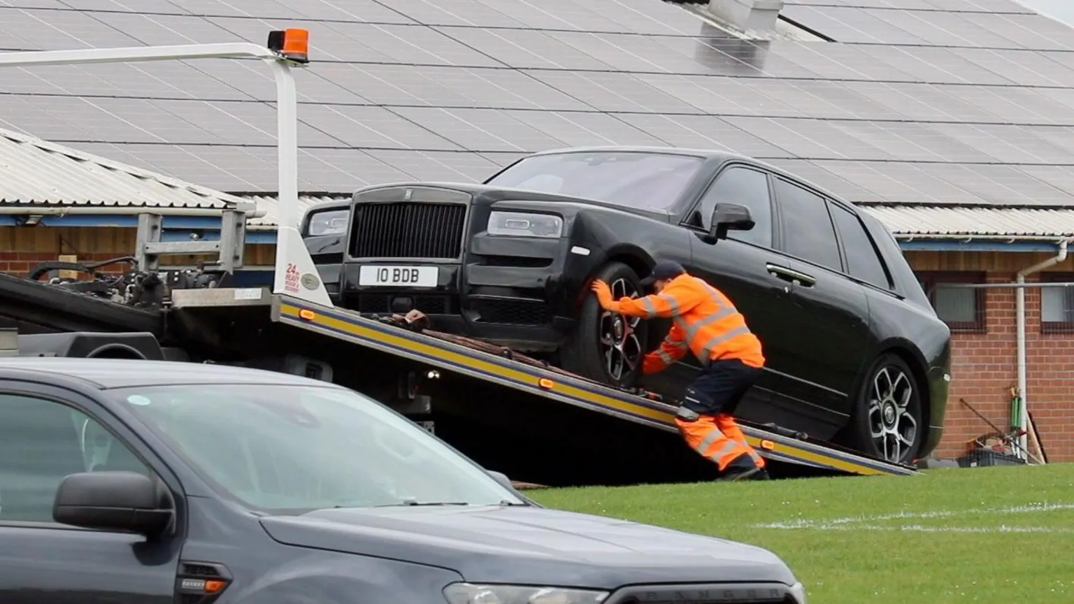 Stuart Woodward/BBC A black Rolls-Royce with the number plate