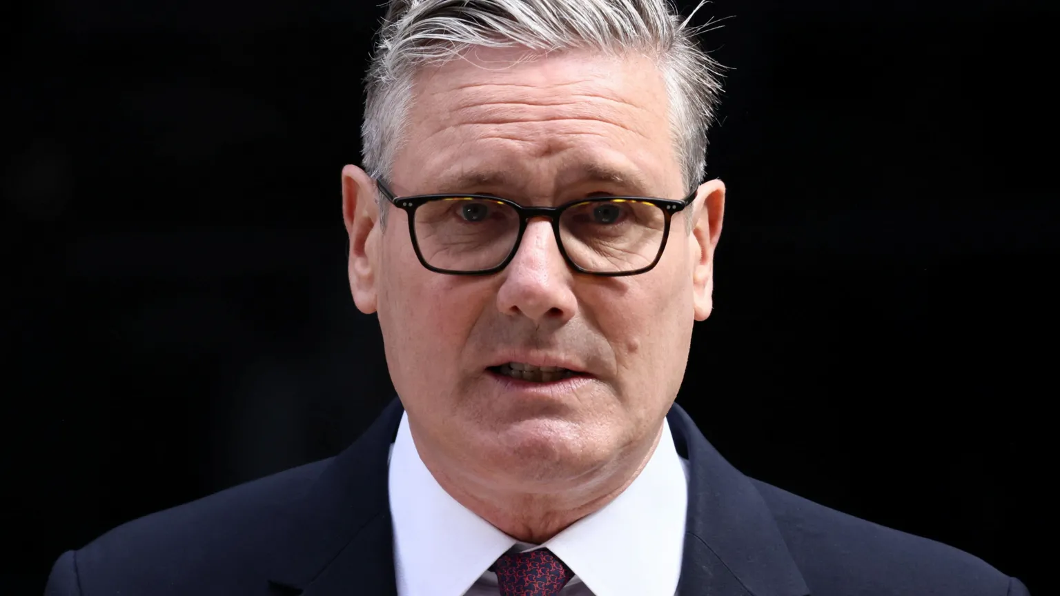Prime Minister Sir Keir Starmer announces his resignation outside 10 Downing Street in London.