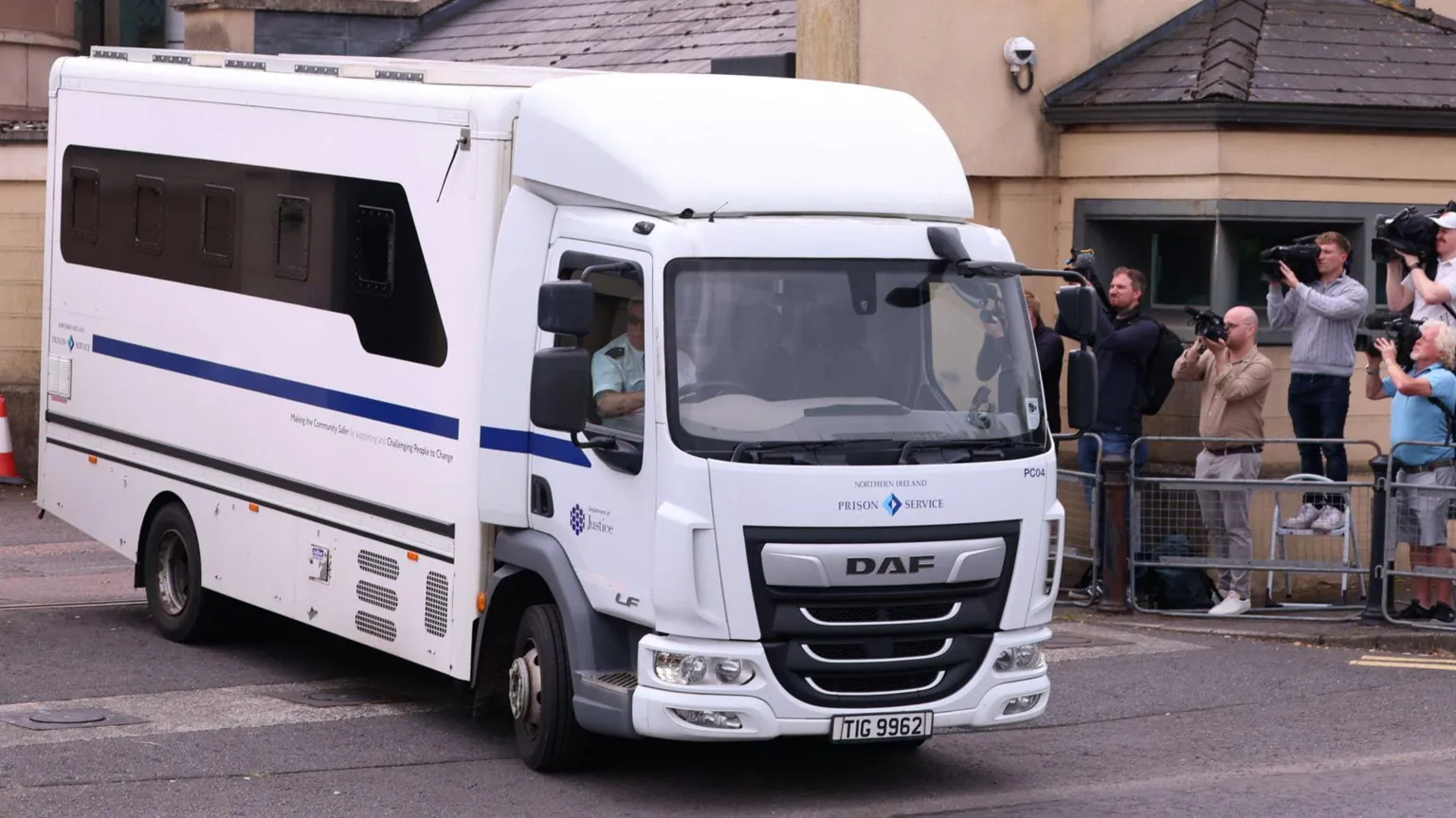 A white prison van carrying former DUP leader Sir Jeffrey Donaldson leaves Newry Crown Court