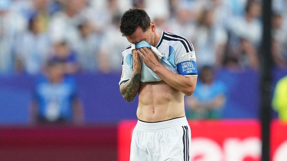 Lionel Messi holds his shirt to his face while in tears after scoring the opening goal in Argentina's 3-0 2026 FIFA World Cup victory over Argentina