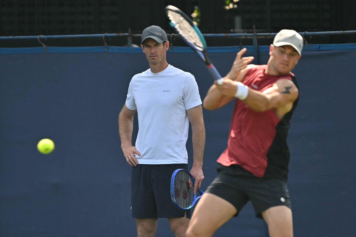 Jack Draper practises under the watchful eye of his new coach Andy Murray.