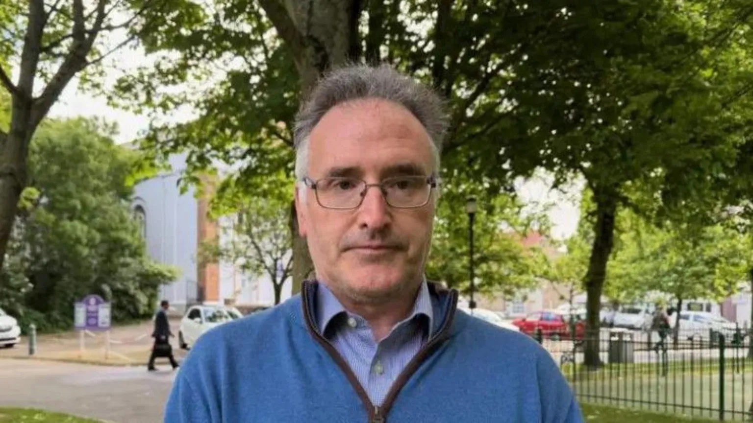 Patrick Lynch is pictured in parade gardens. He is wearing a blue fleece and a blue shirt.