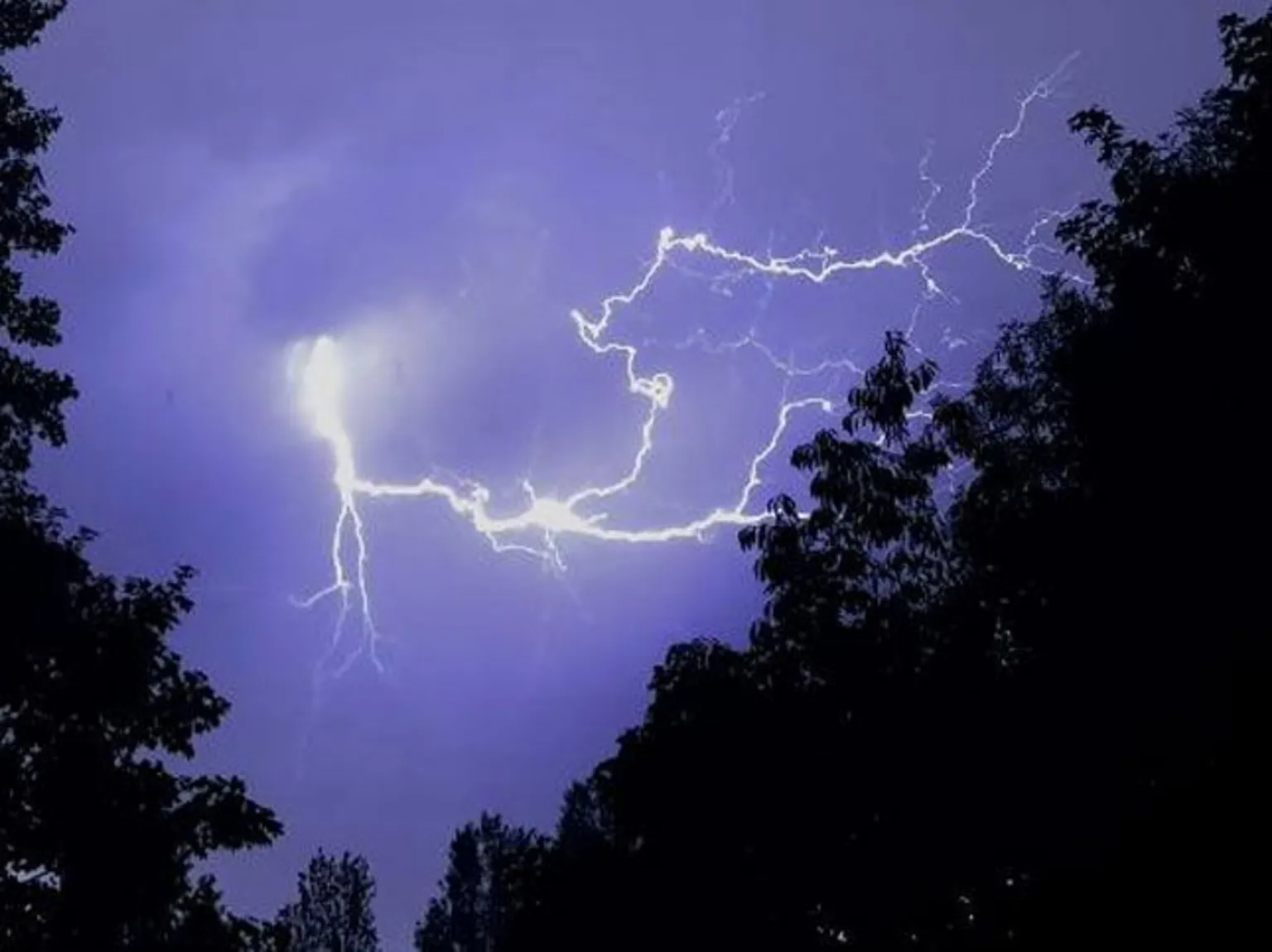 Peter Barrett / Weather Watchers Lightning lights up the night sky in Hornchurch, Greater London