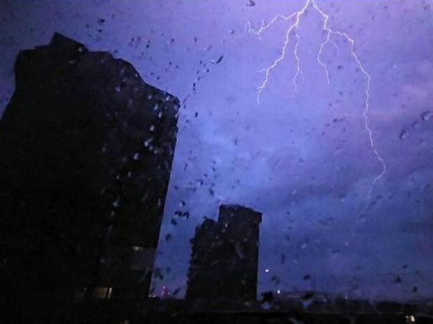 Lightning lights up the night sky in Chelsea, Greater London