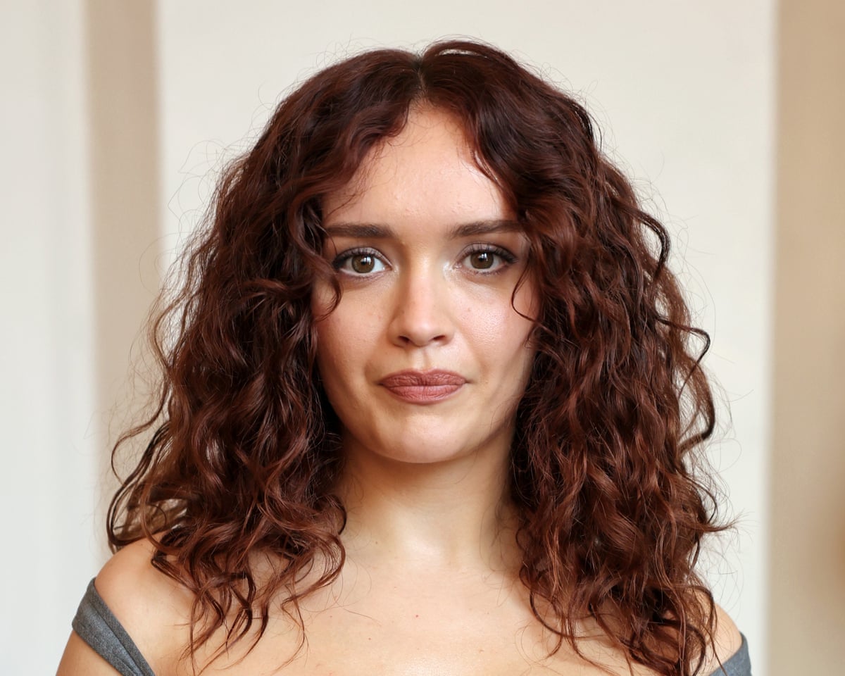 Olivia Cooke: she is in her early 30s and has long, dark wavy hair and brown eyes.