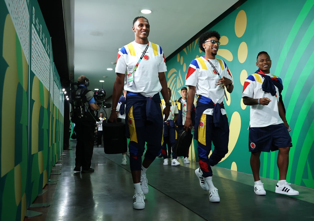 Colombian players make their way to the changrooms.