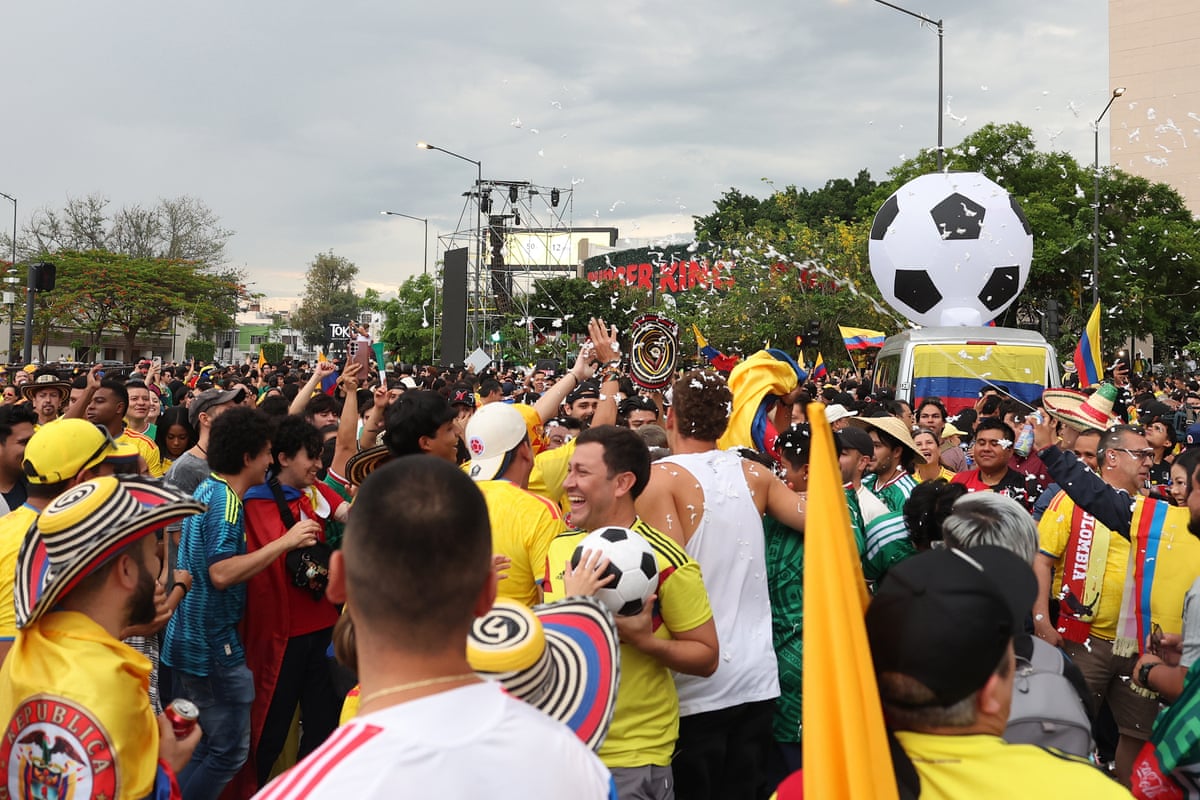 Fans get the party started early at the La Minerva roundabout in Guadalajara.