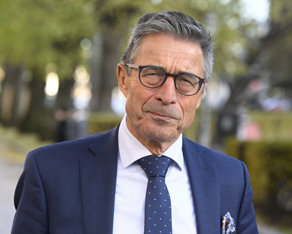 Anders Fogh Rasmussen in blue suit and glasses