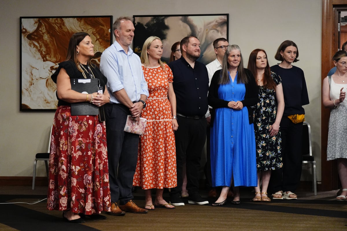 The Nottingham families standing together at the press conference.