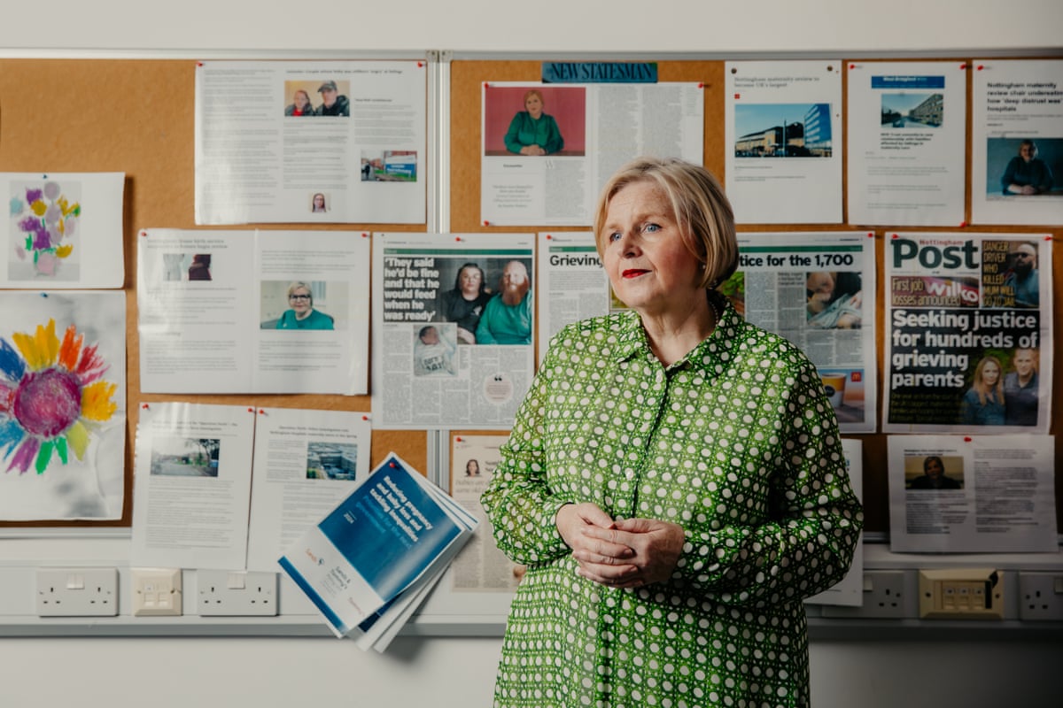 Donna Ockenden stood in front of a notice board in her office.