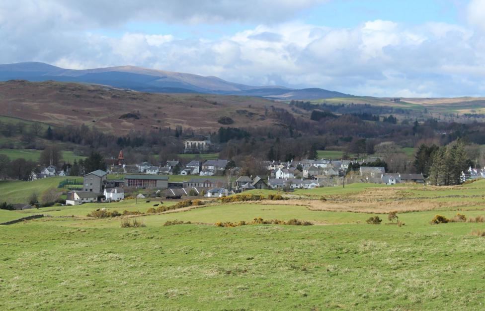 A wider view of the countryside around the town of Dalry with rolling hills and fields