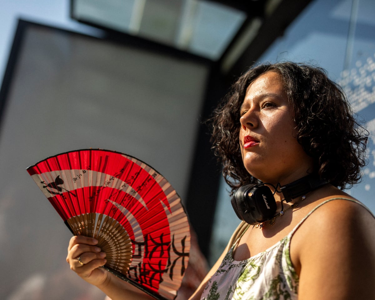 Noah holding a fan