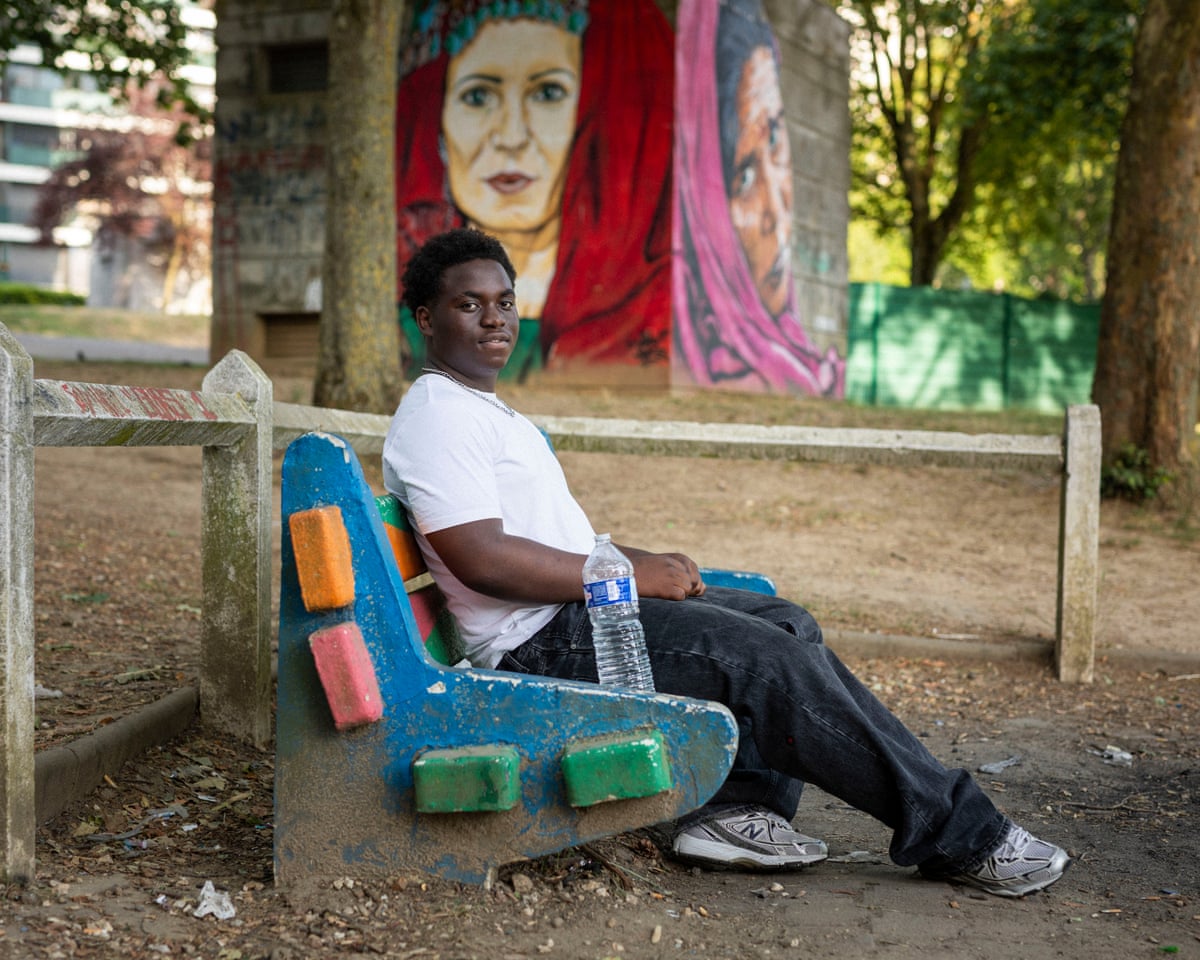 Roland sitting on a park bench