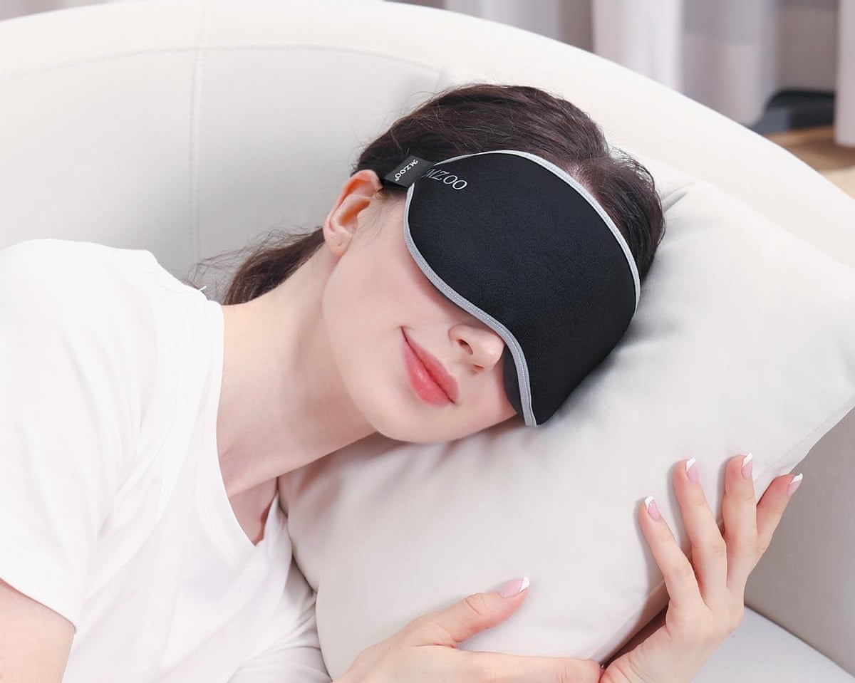 woman sleeping with black eye mask