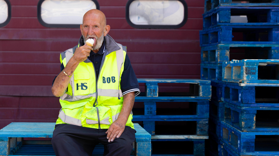 Bob enjoys a free ice cream handed out at TradePoint Barking in London as part of a B&Q TradePoint giveaway with more than 1,000 ice creams offered at selected stores across the UK, supporting trade workers during what is expected to be the hottest day of the year so far 