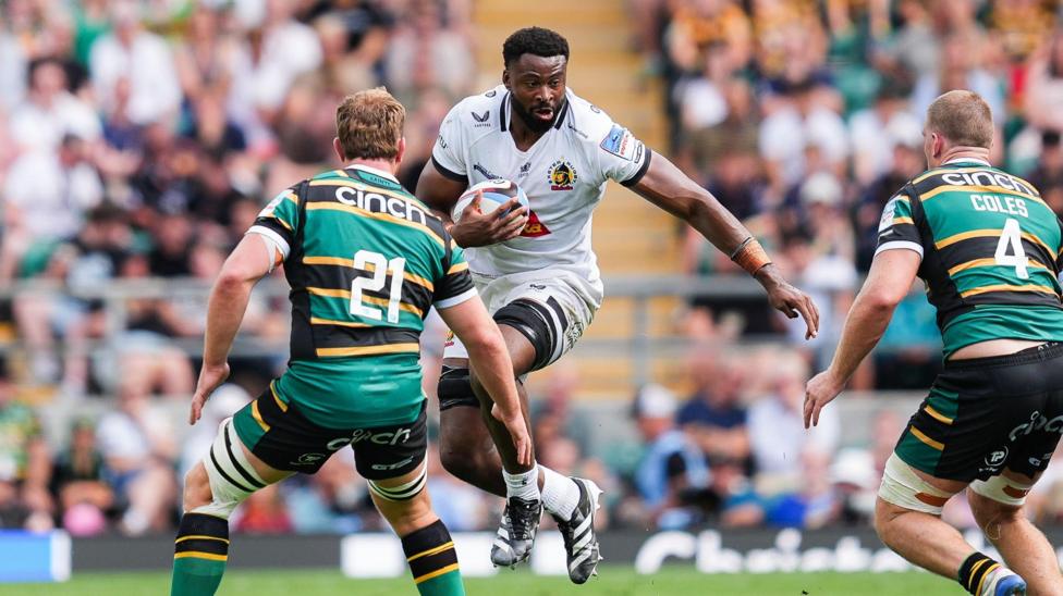 Christ Tshiunza looks to avoid a tackle with Exeter against Northampton