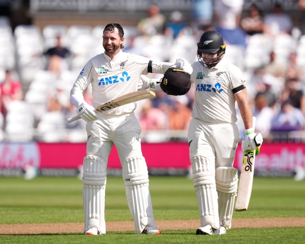 New Zealand’s Tom Latham and Devon Conway celebrate together during their opening partnership of 317 against England at Trent Bridge