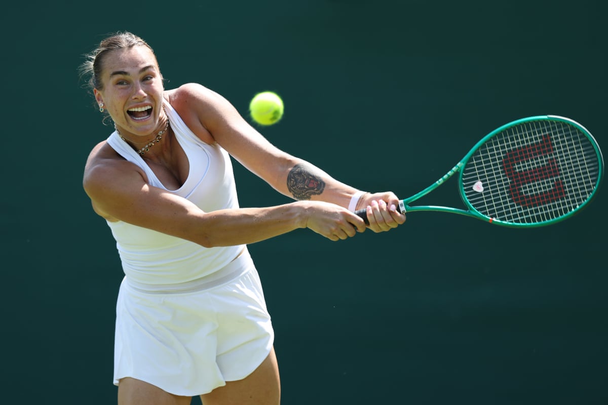 Aryna Sabalenka plays a backhand in a practice match against Maria Sakkari