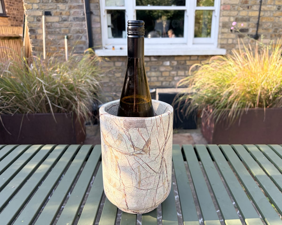 The H&M marble wine cooler on a garden table.