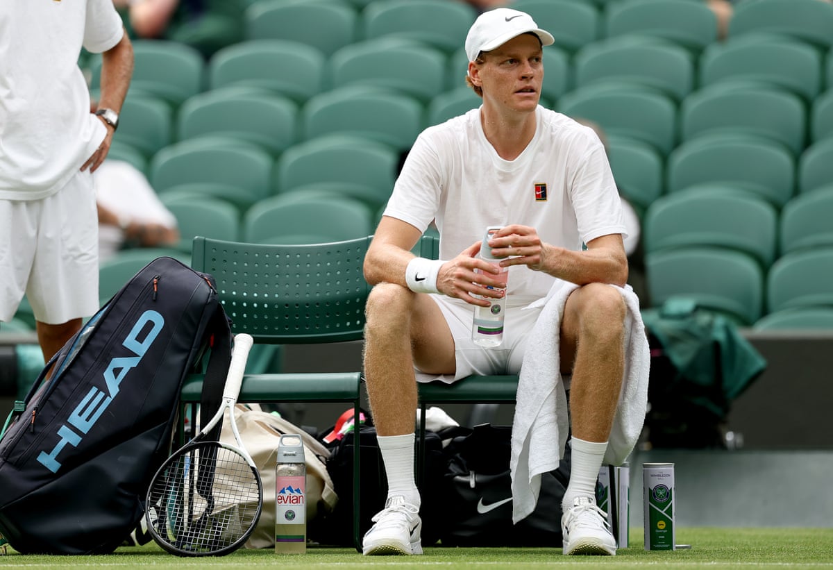 Jannik Sinner sits down at Wimbledon