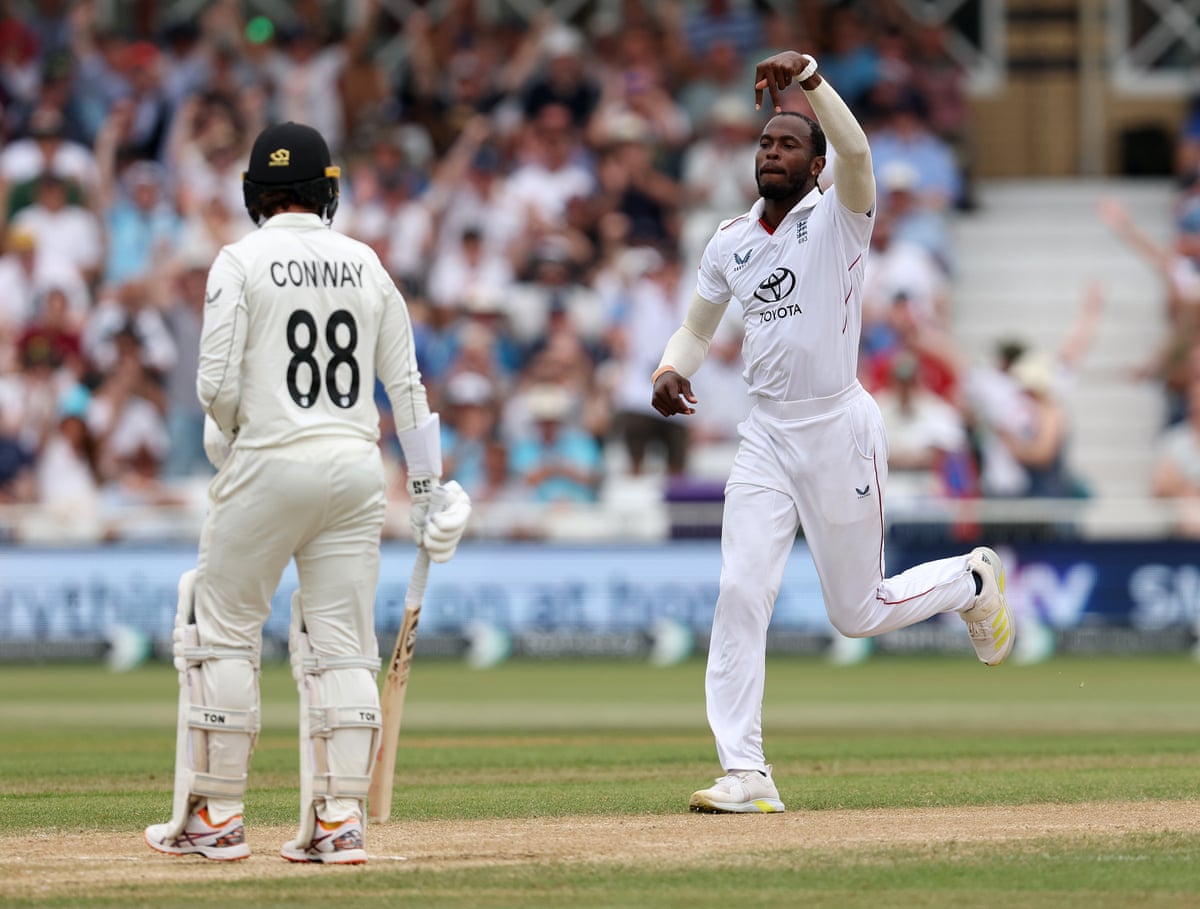 Jofra Archer of England celebrates after taking the wicket of Devon Conway