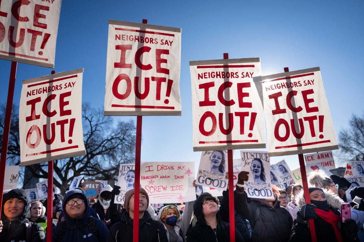 people holding signs 