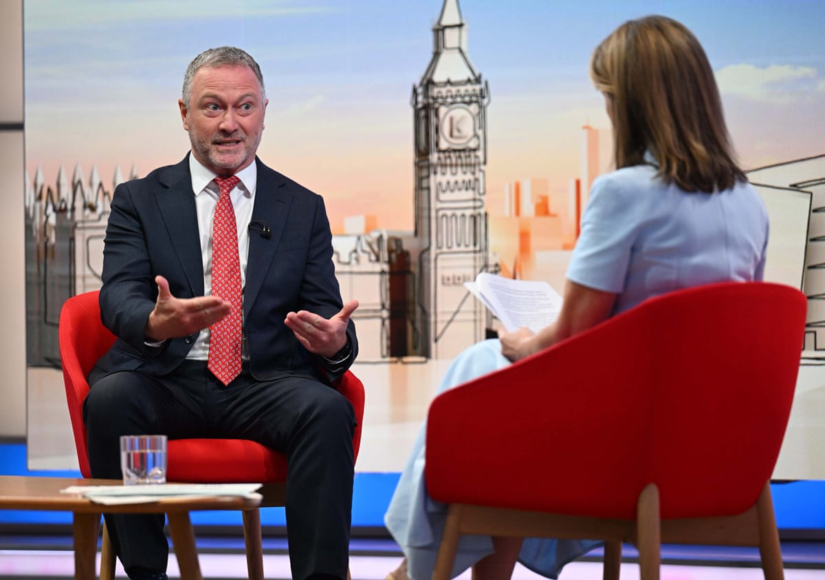 Steve Reed talks to Victoria Derbyshire on the BBC show. There is a backdrop behind them depicting Westminster, the Houses of Parliament and Big Ben. 