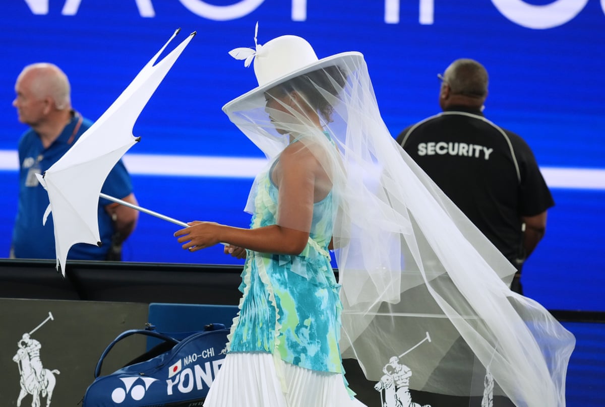 Naomi Osaka in her jellyfish-inspired dress with parasol