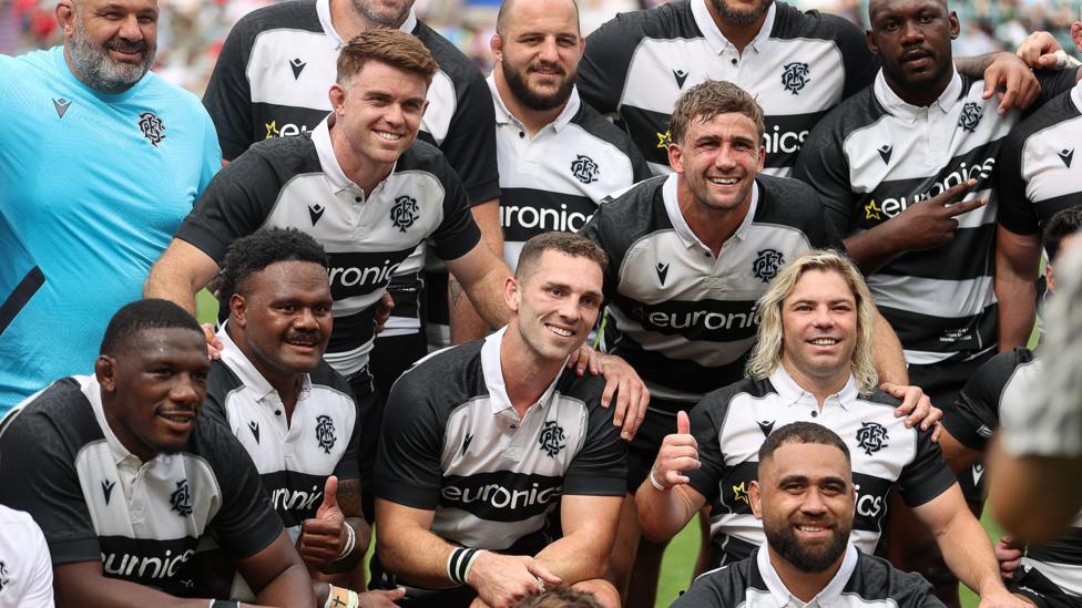 Barbarians players huddle at the end of the Wales defeat