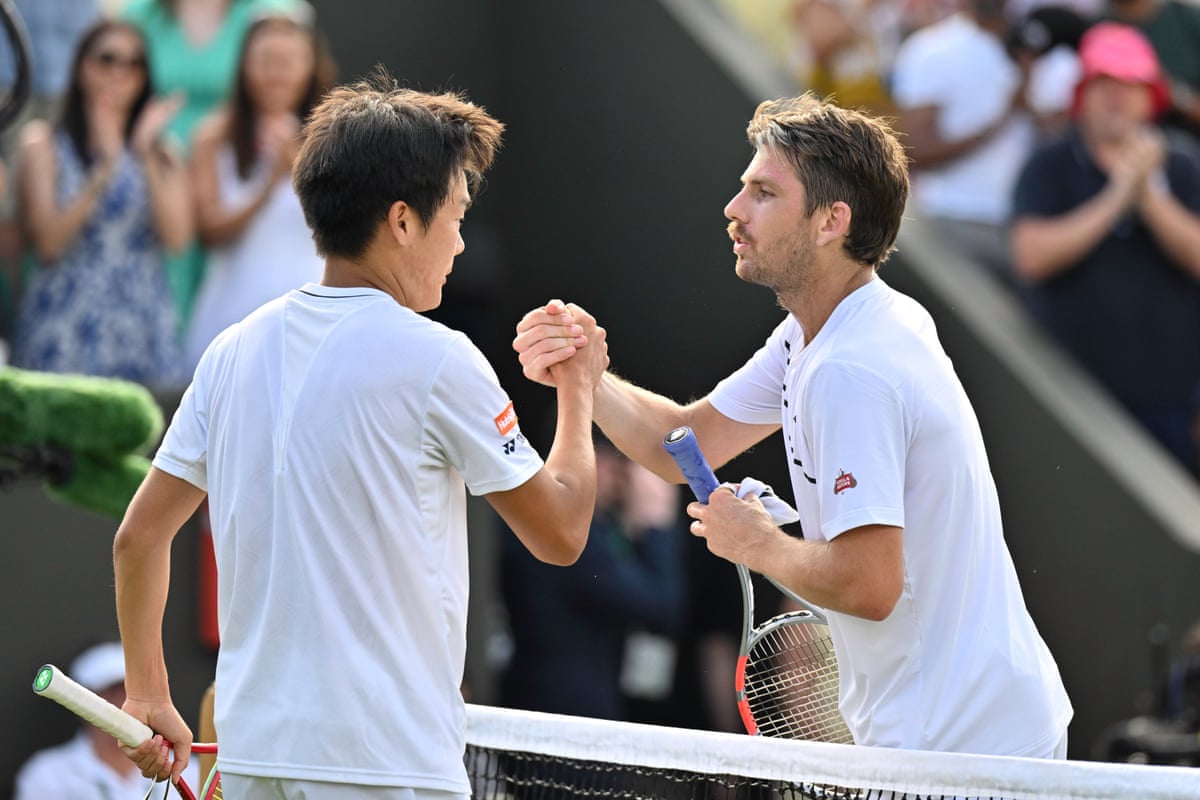Cameron Norrie congratulates Michael Zheng on his victory