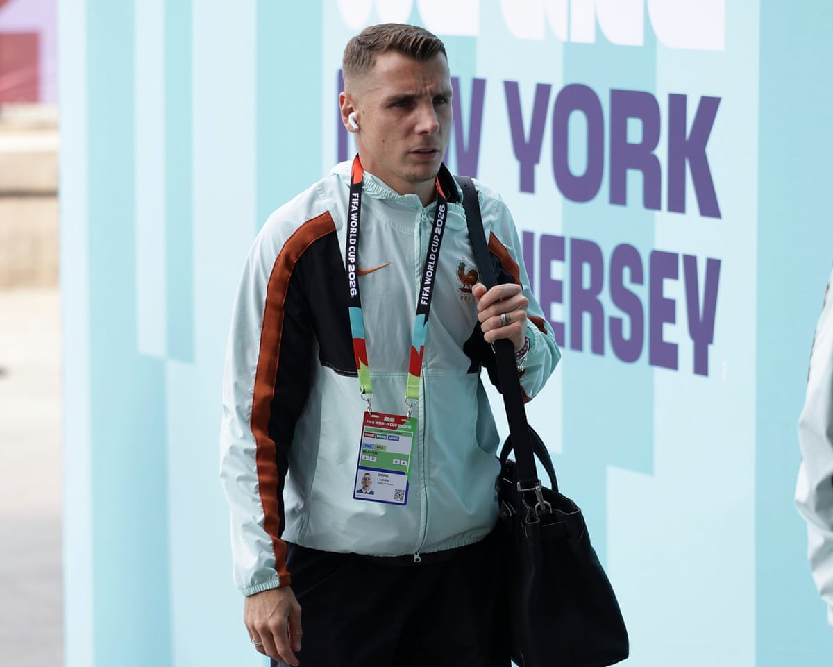 Lucas Digne wanders into the stadium.