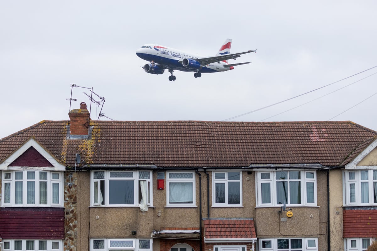 A passenger airplane, operated by British Airways, comes in to land at London Heathrow Airport in London in 2025.