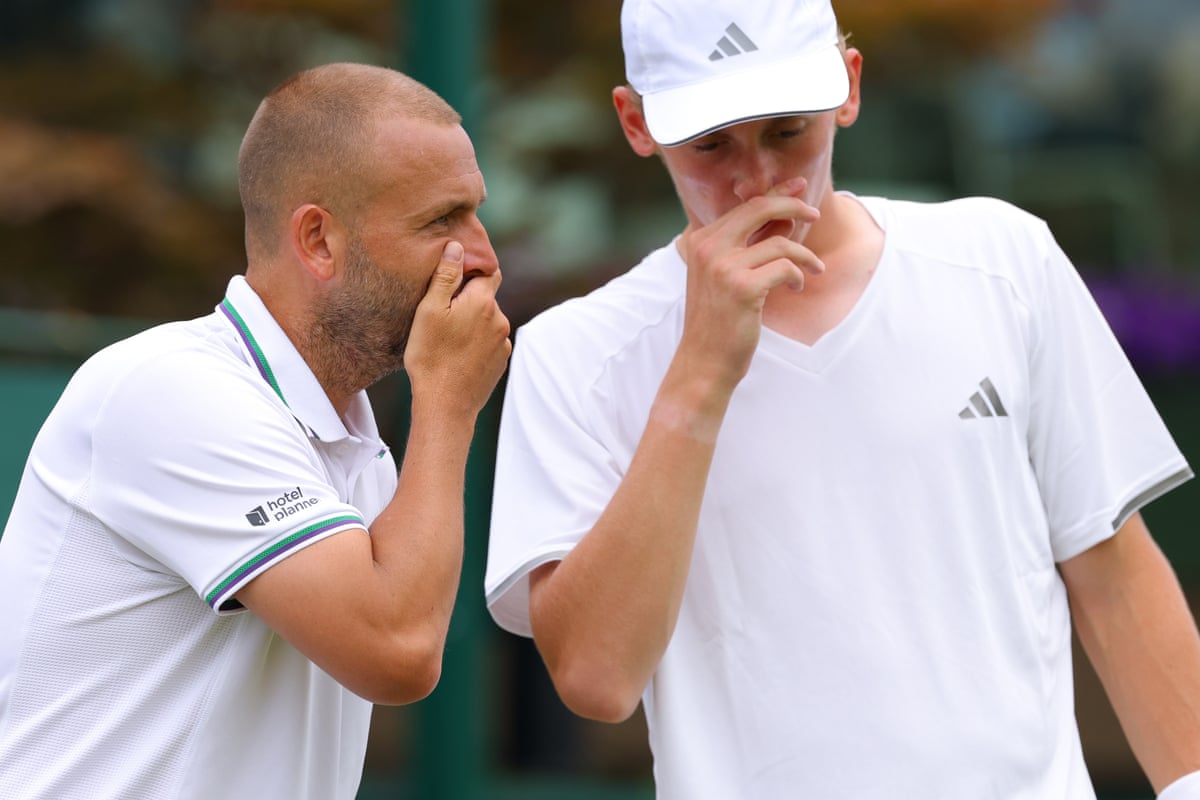 Dan Evans (left) on court with Henry Searle
