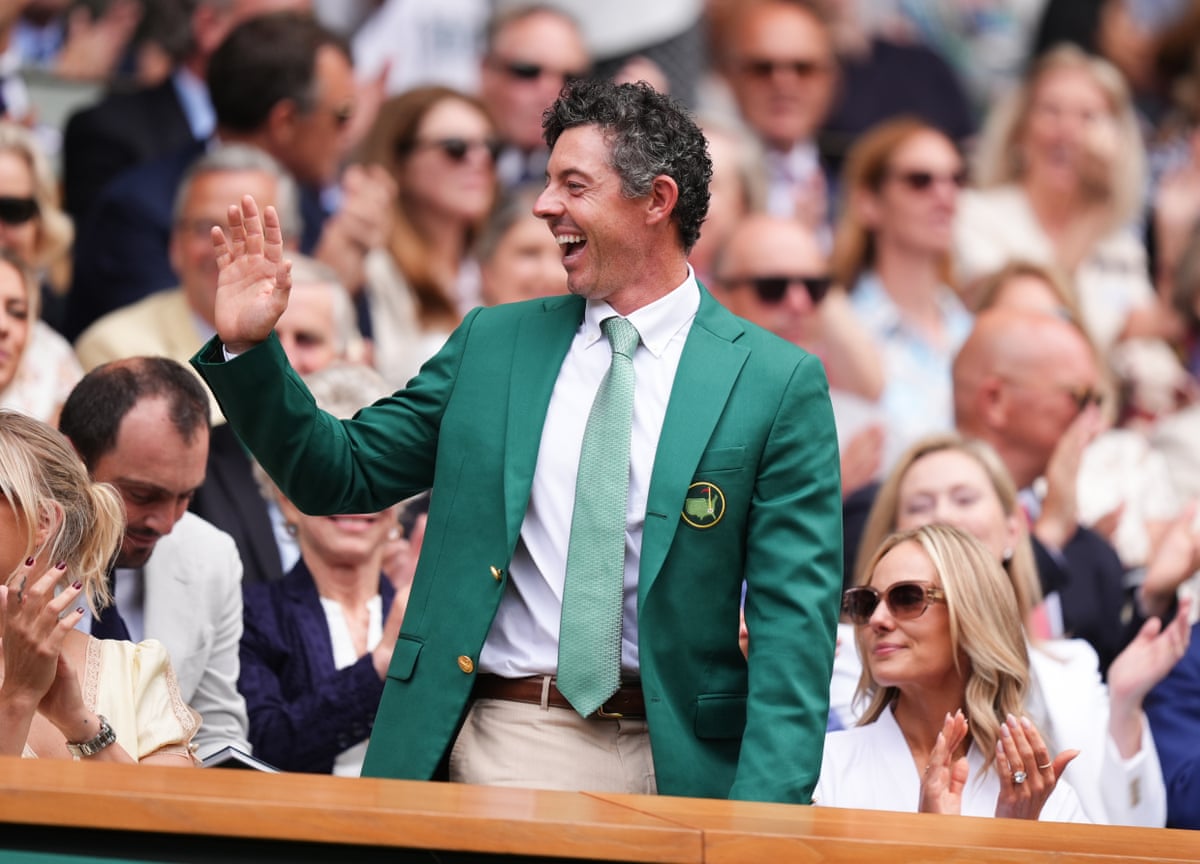 Rory McIlroy waves from the Royal Box.