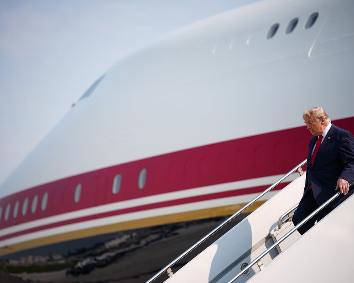 Donald Trump disembarks from Air Force One as he arrives in Bismarck, North Dakota.