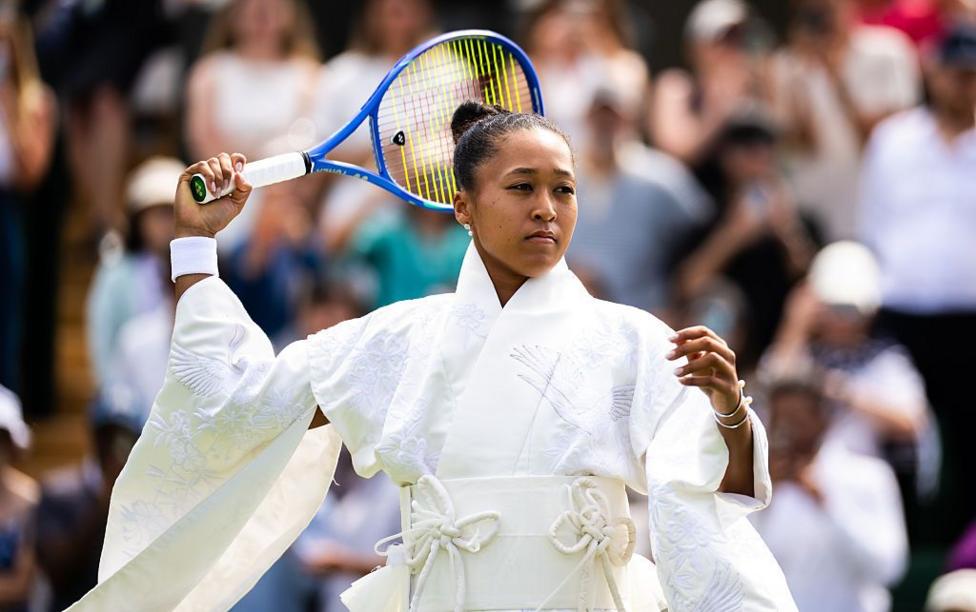 Naomi Osaka wears a kimono during her warm-up before her opening match at Wimbledon