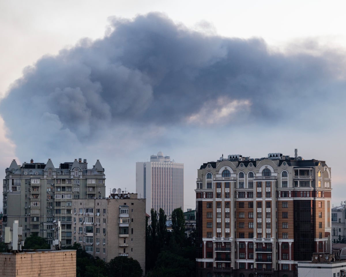 Smoke is seen as two major fires burn after a drone and missile attack by Russian forces on July 2, 2026 in Kyiv, Ukraine.