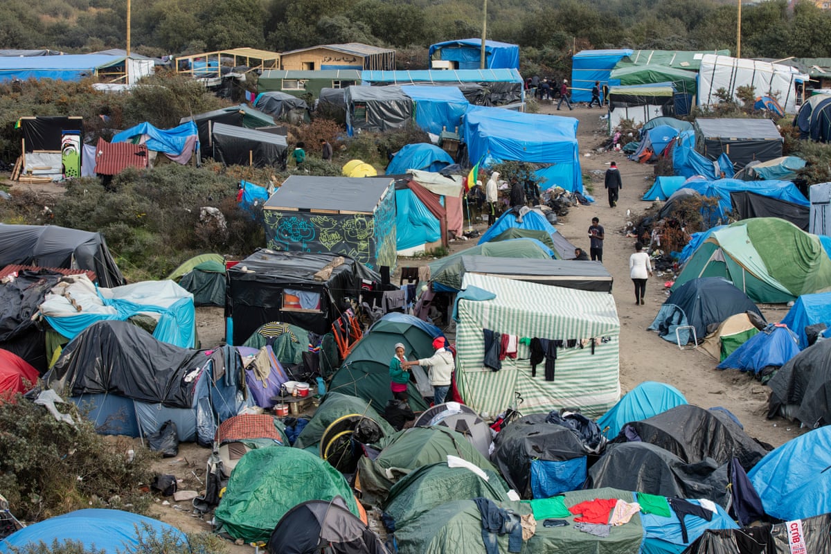 View of tents set up in the camp, with a path leading through them