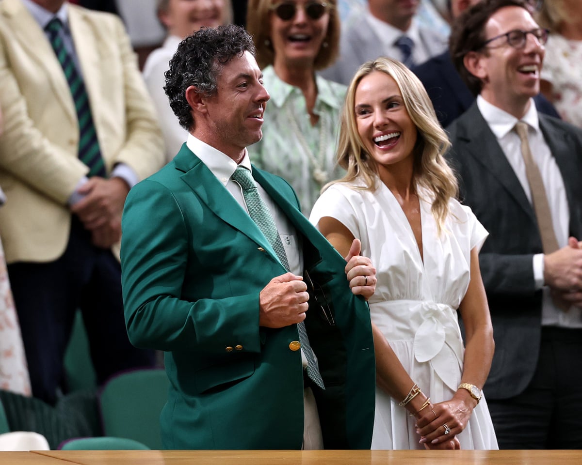 Rory McIlroy wearing his green Masters jacket