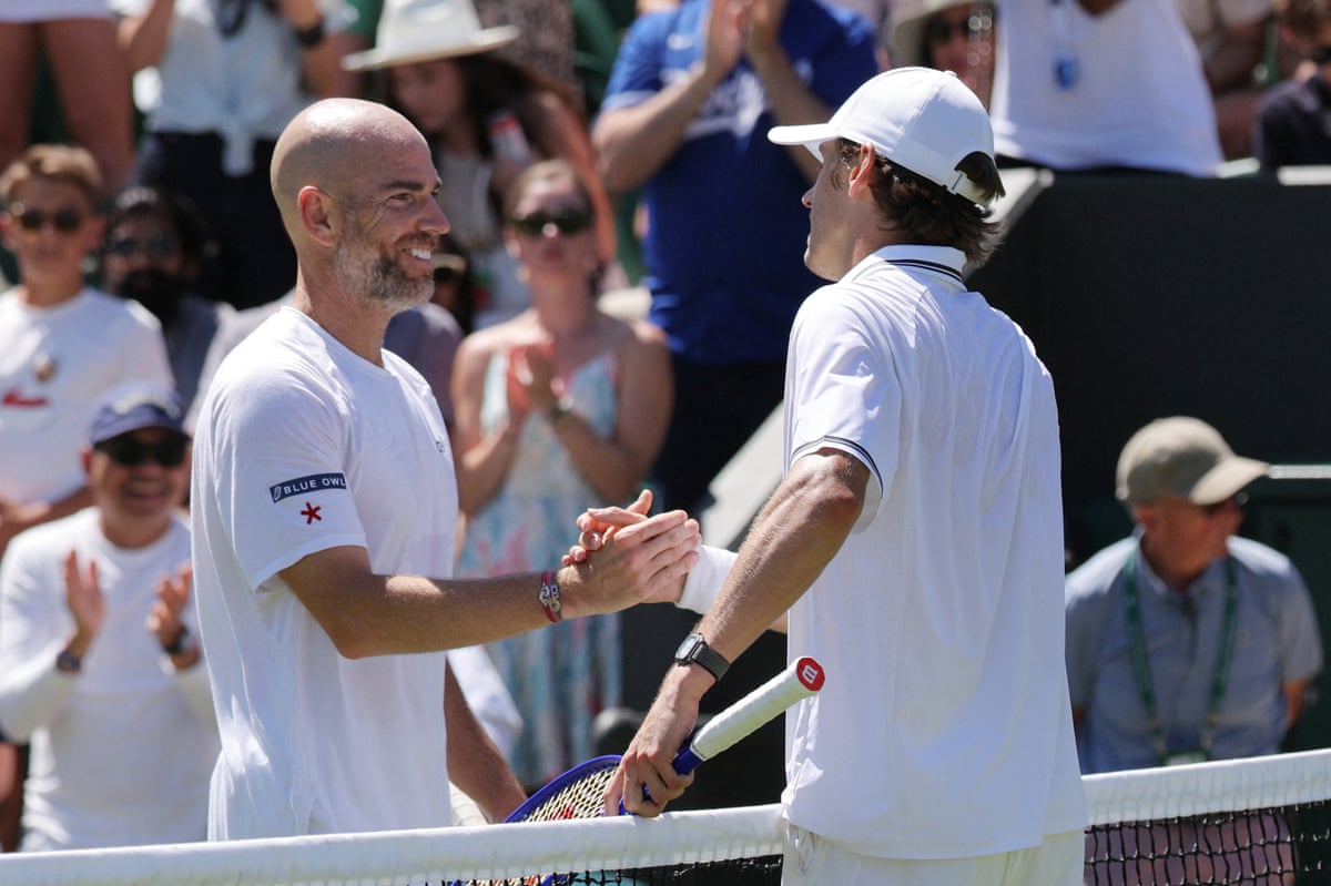 Alex de Minaur shakes hands with France's Adrian Mannarino after winning their second round match.